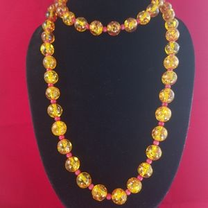 Vintage faux Amber  and Red Coral 44" long necklace Red inclusions